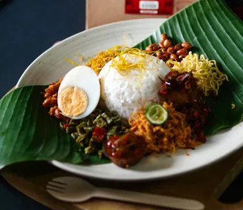 Nasi lemak, a Malaysian favourite, served on a banana leaf